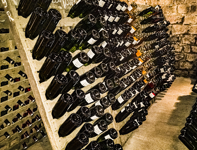 Bouteilles en maturation | © Bert Schwarz 2026